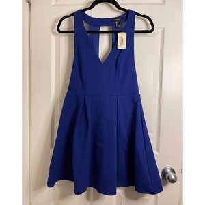 Med Royal Blue low v neckline skater dress